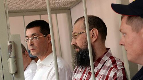 Бывший заместитель главы Минрегионразвития Роман Панов получил шесть с половиной лет колонии общего режима, его подельники, среди которых был руководитель ФКУ «Дальневосточная дирекция Минрегионразвития России» Олег Букалов, также были приговорены к лишению свободы на различные сроки. Фото: Геннадий Гуляев /  Коммерсантъ